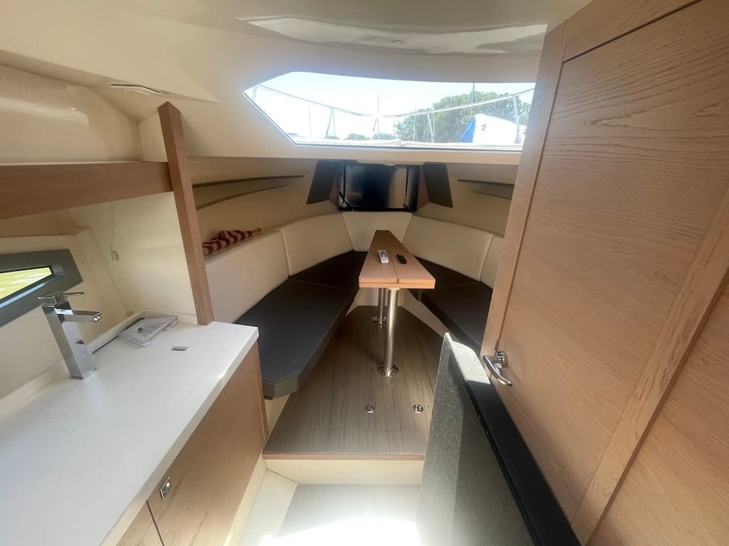 2015 Faeton 36 Formentera galley with cooktop, sink, and refrigerator