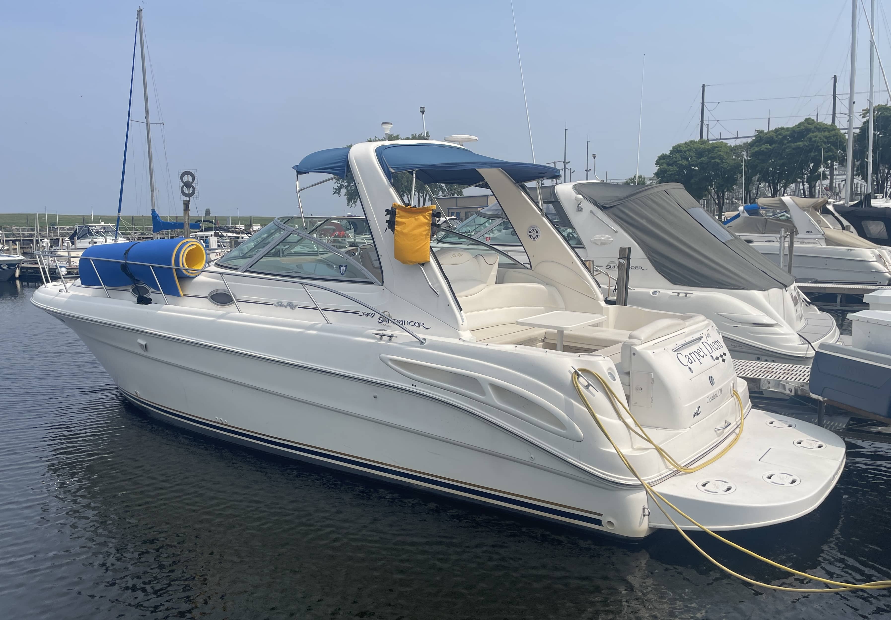 1999 Sea Ray Sundancer 340 profile view with factory radar arch for sale in Cleveland on Lake Erie