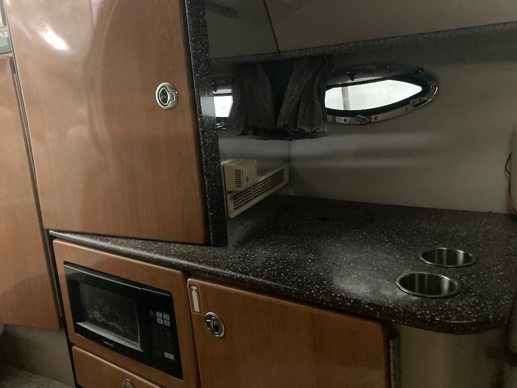 2004 Formula 330 SS enclosed head with flush toilet and sink
