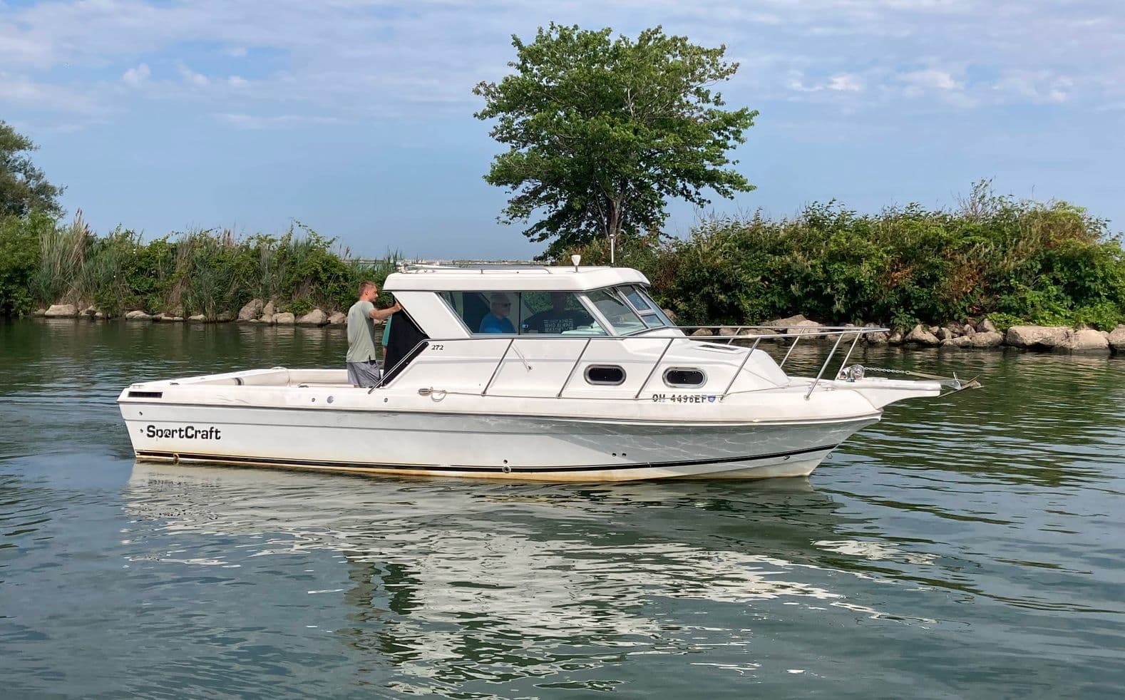 Clayton Weber aboard a SportCraft powerboat on Lake Erie along the Ohio shoreline