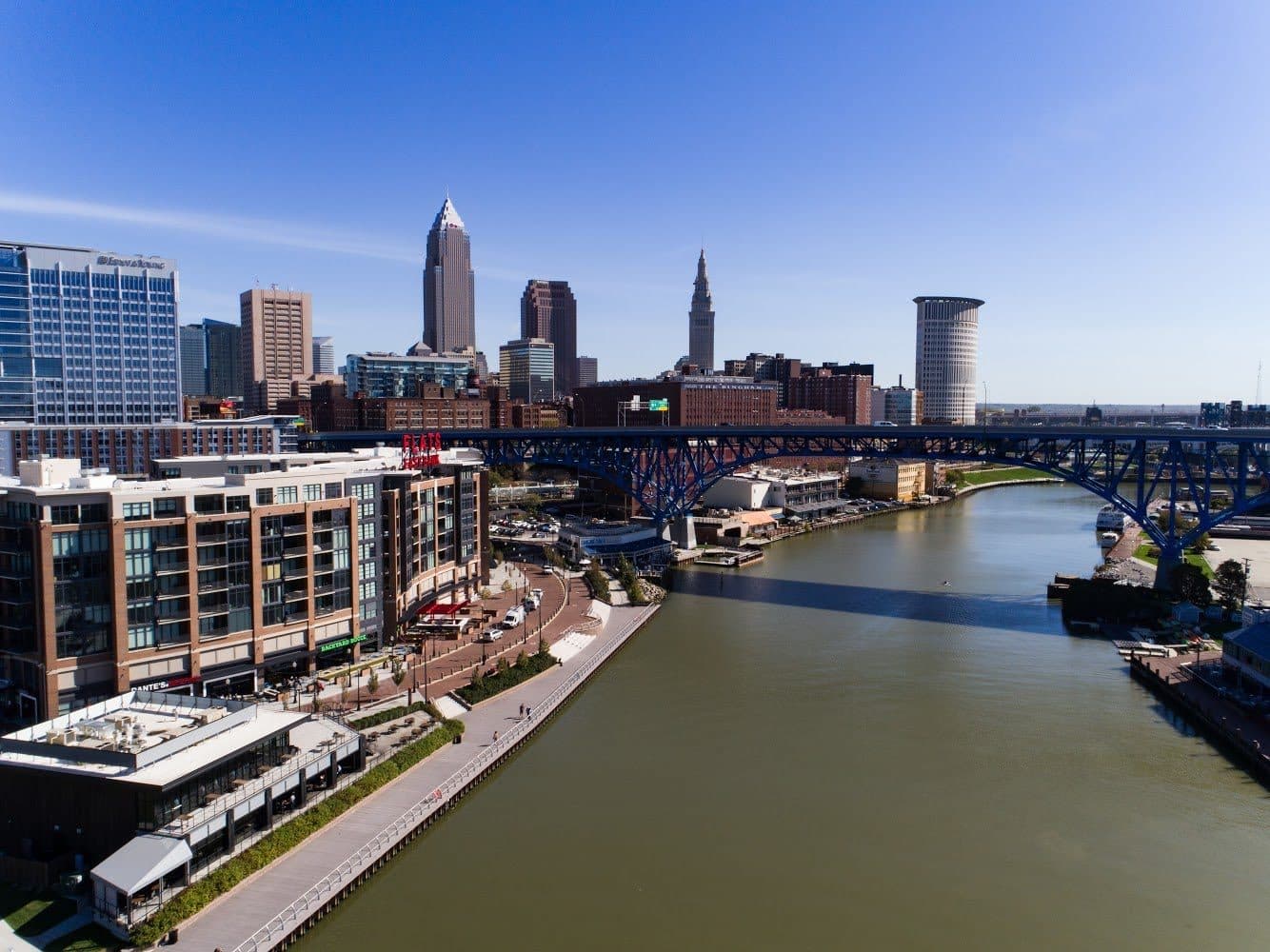 Aerial drone photo of the Cuyahoga River and downtown Cleveland skyline