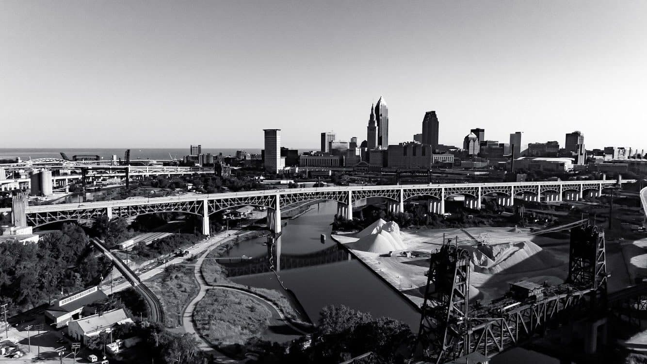 Black and white aerial photo of the Cleveland skyline