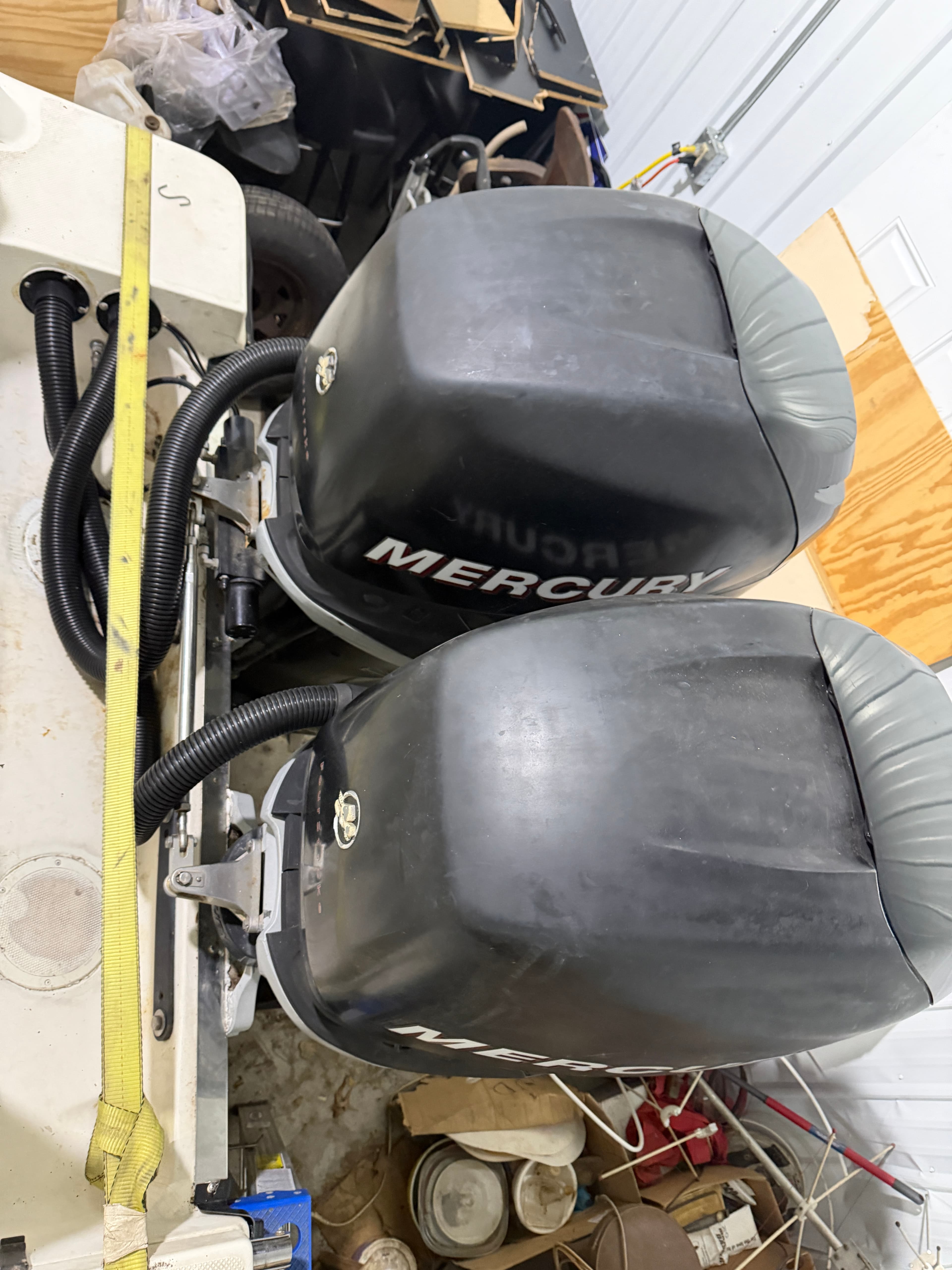 2005 Trophy 2503 center console stern view showing twin Mercury Verado outboards