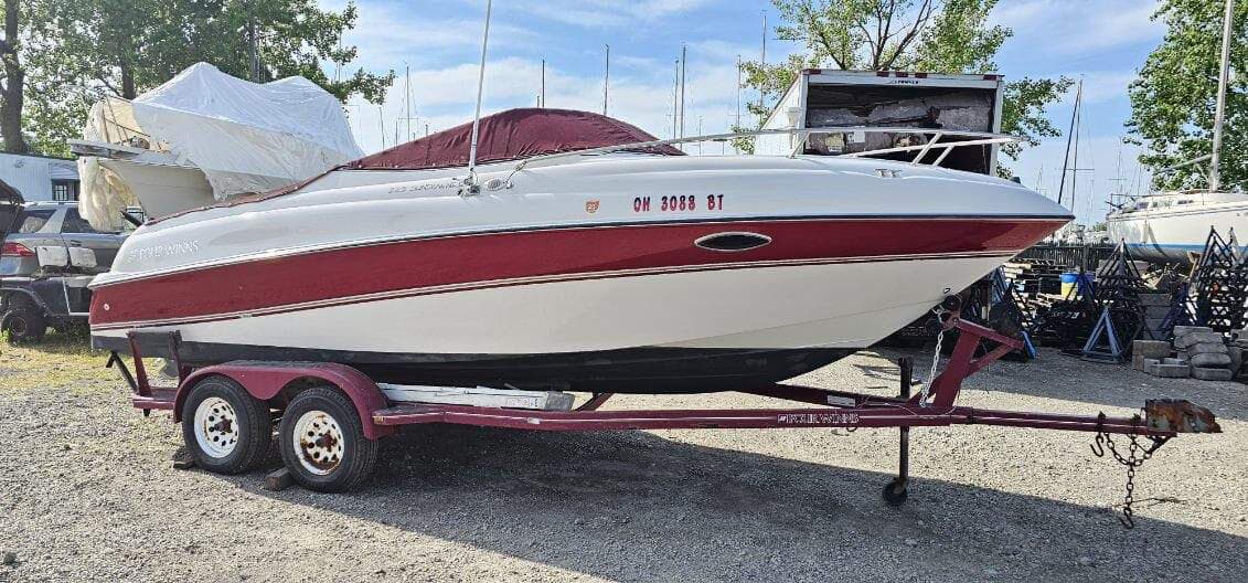 1996 Four Winns Sundowner 225 exterior profile with trailer for sale in Cleveland, Ohio