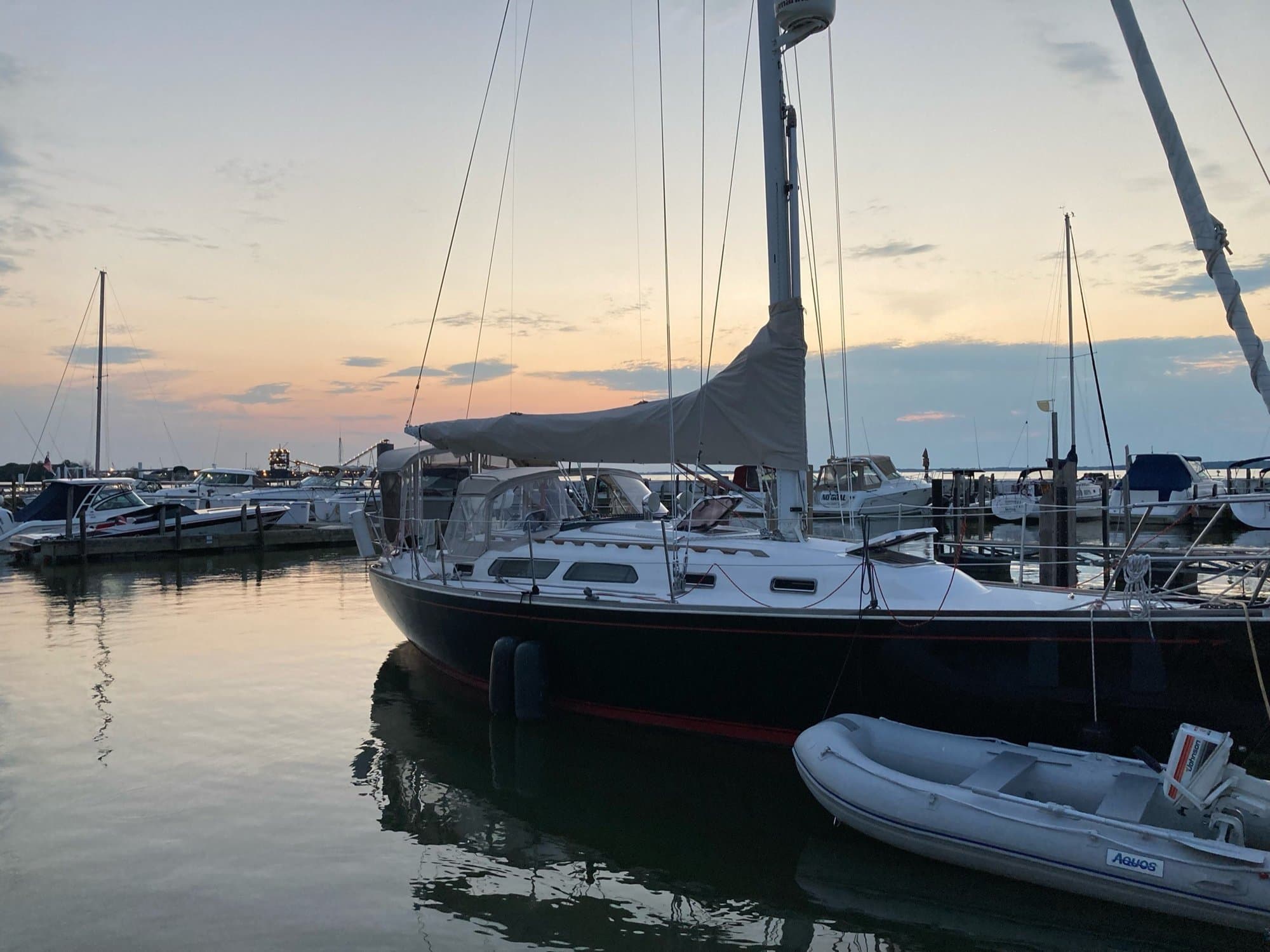 Sailboat moored at dusk in a Cleveland marina on Lake Erie