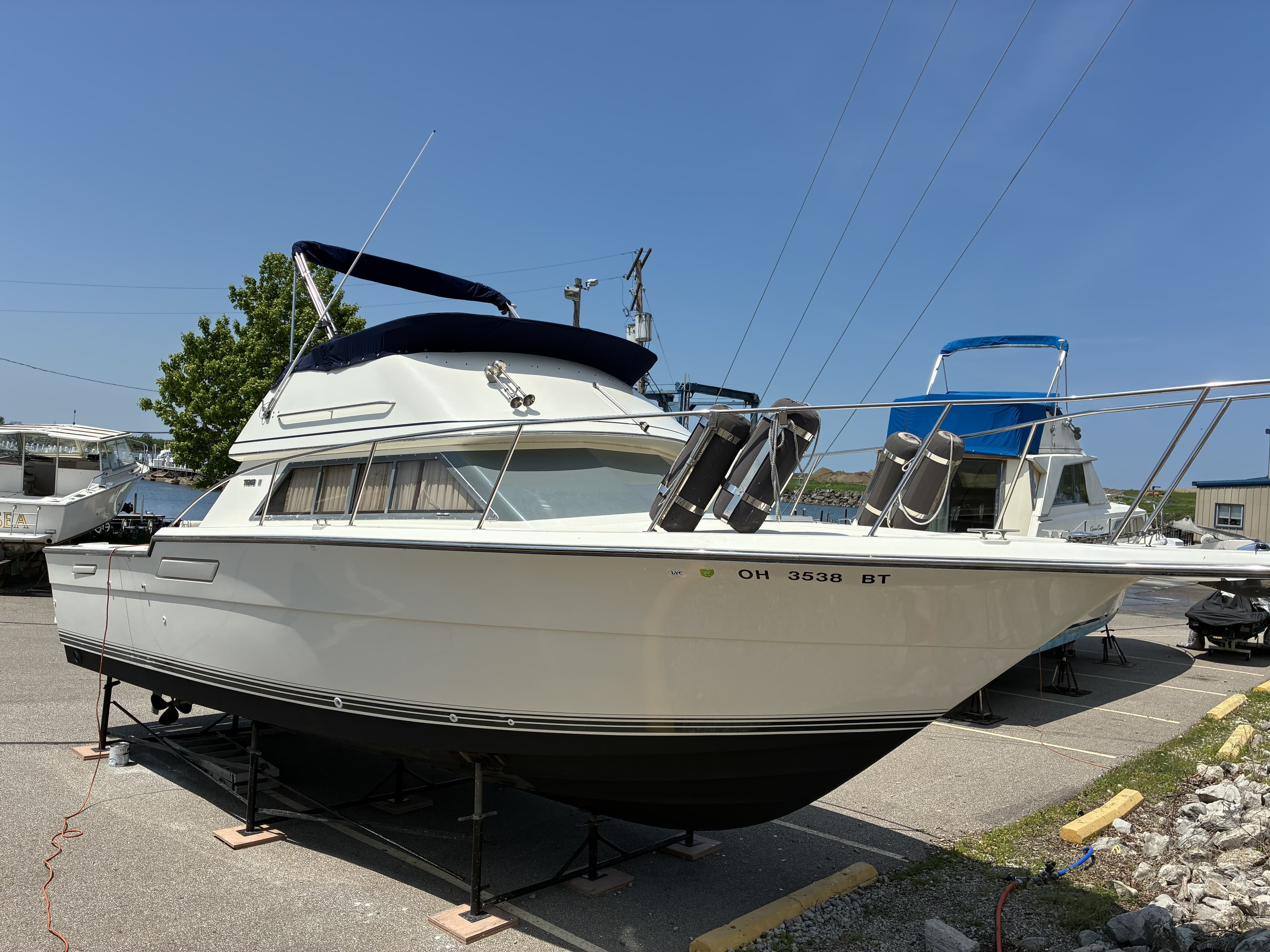 1989 Tiara 3300 Sport Flybridge port side profile on stands in Cleveland, Ohio
