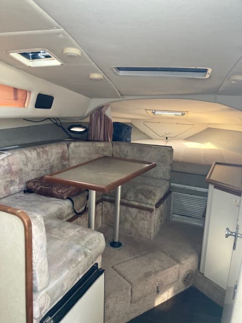 1994 Bayliner 3055 cabin dinette looking forward toward V-berth