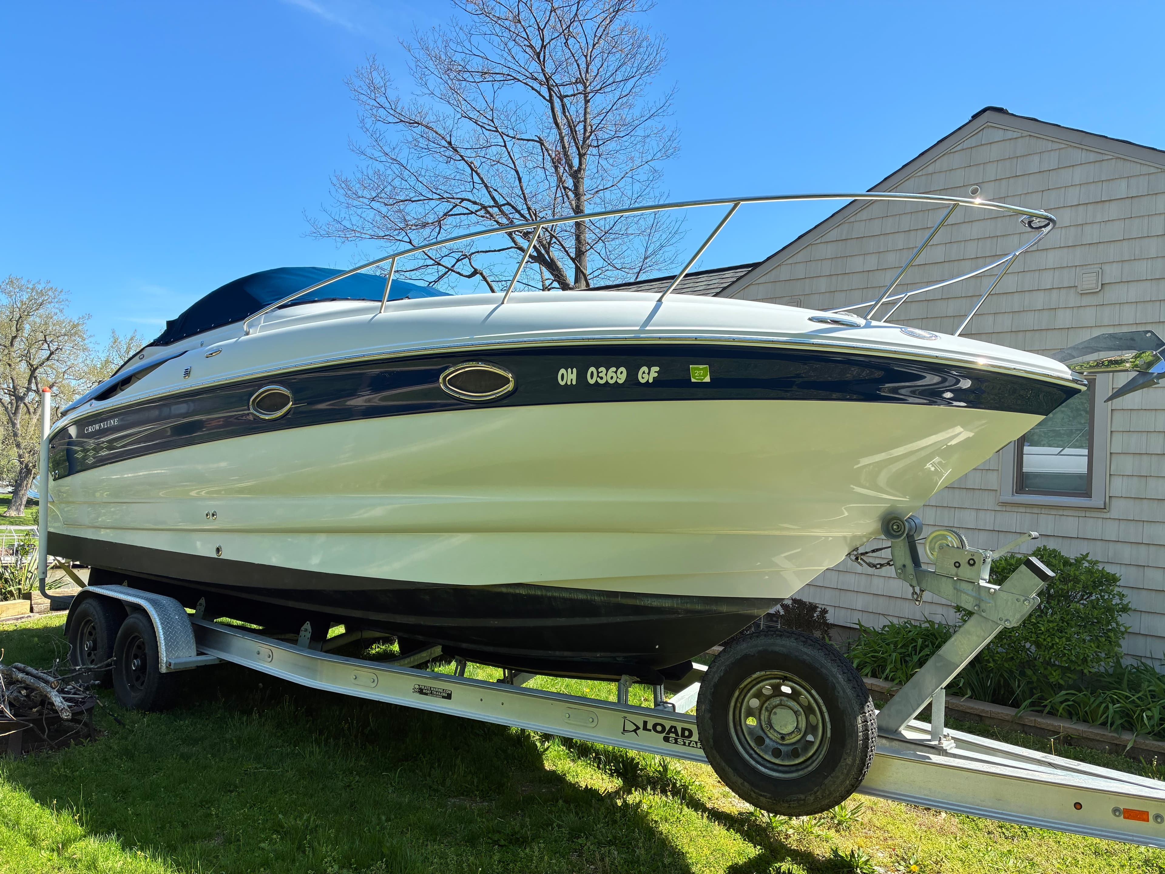 2005 Crownline 270CR bow and starboard side with cockpit cover
