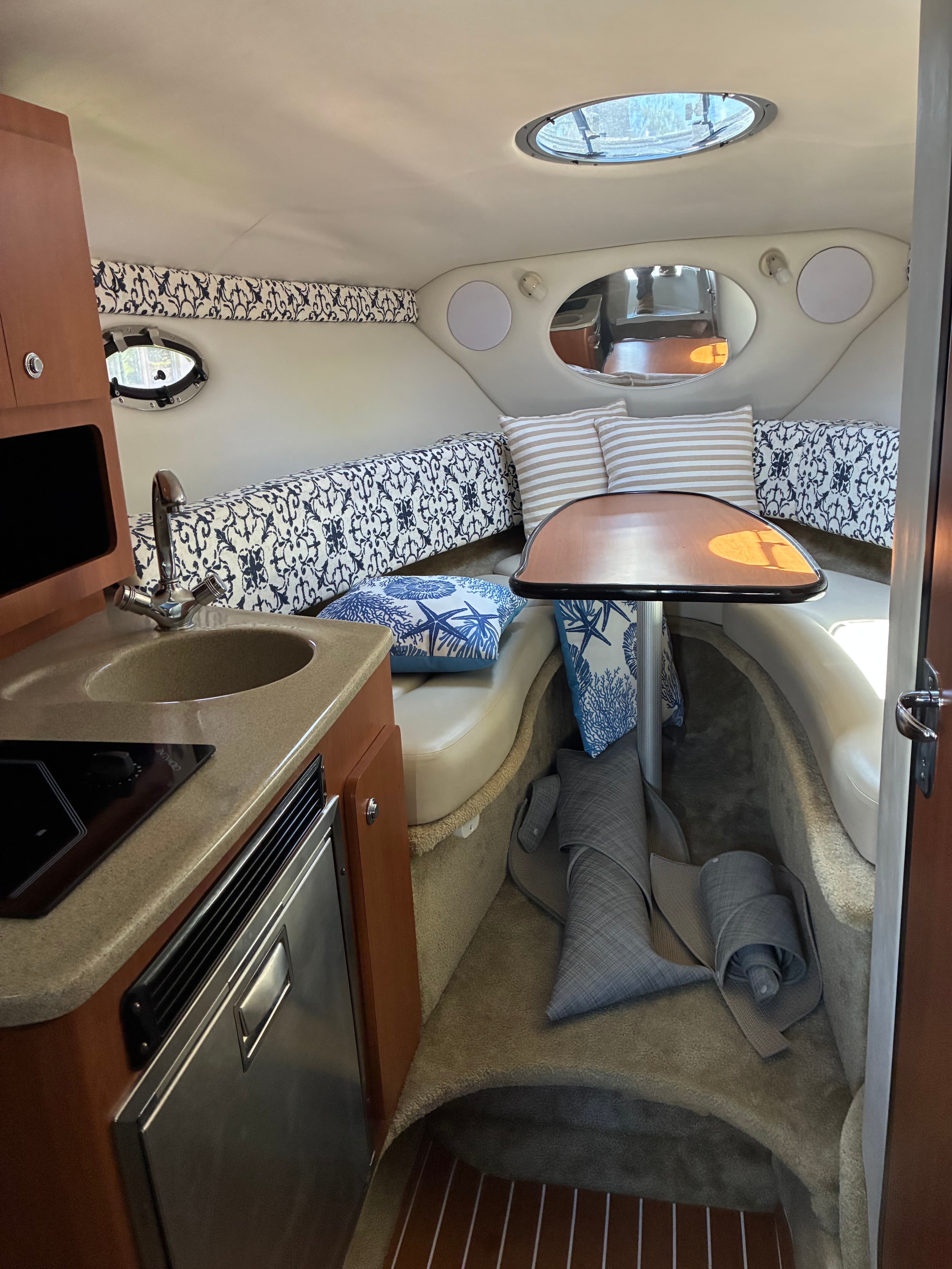 2005 Crownline 270CR cabin portlights and seating