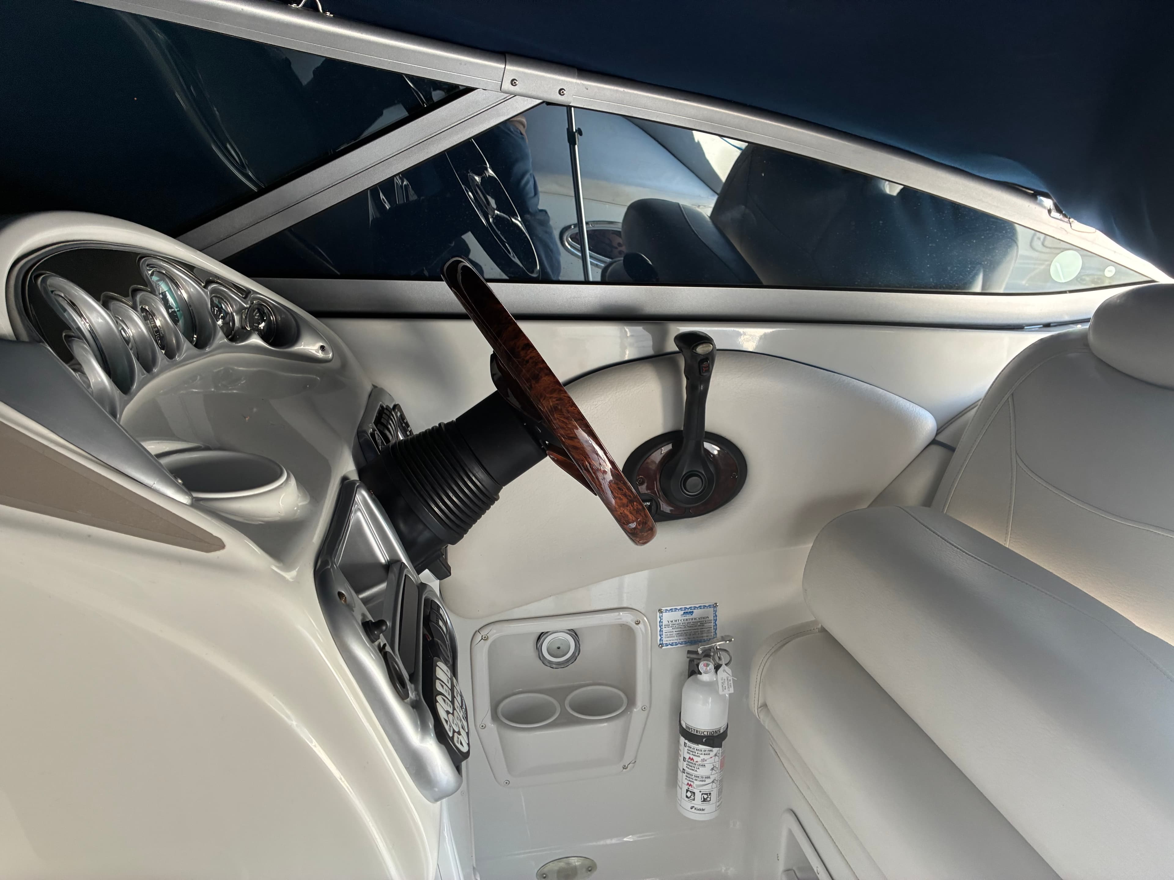 2005 Crownline 270CR cockpit with throttle, shifter and walk-through windshield