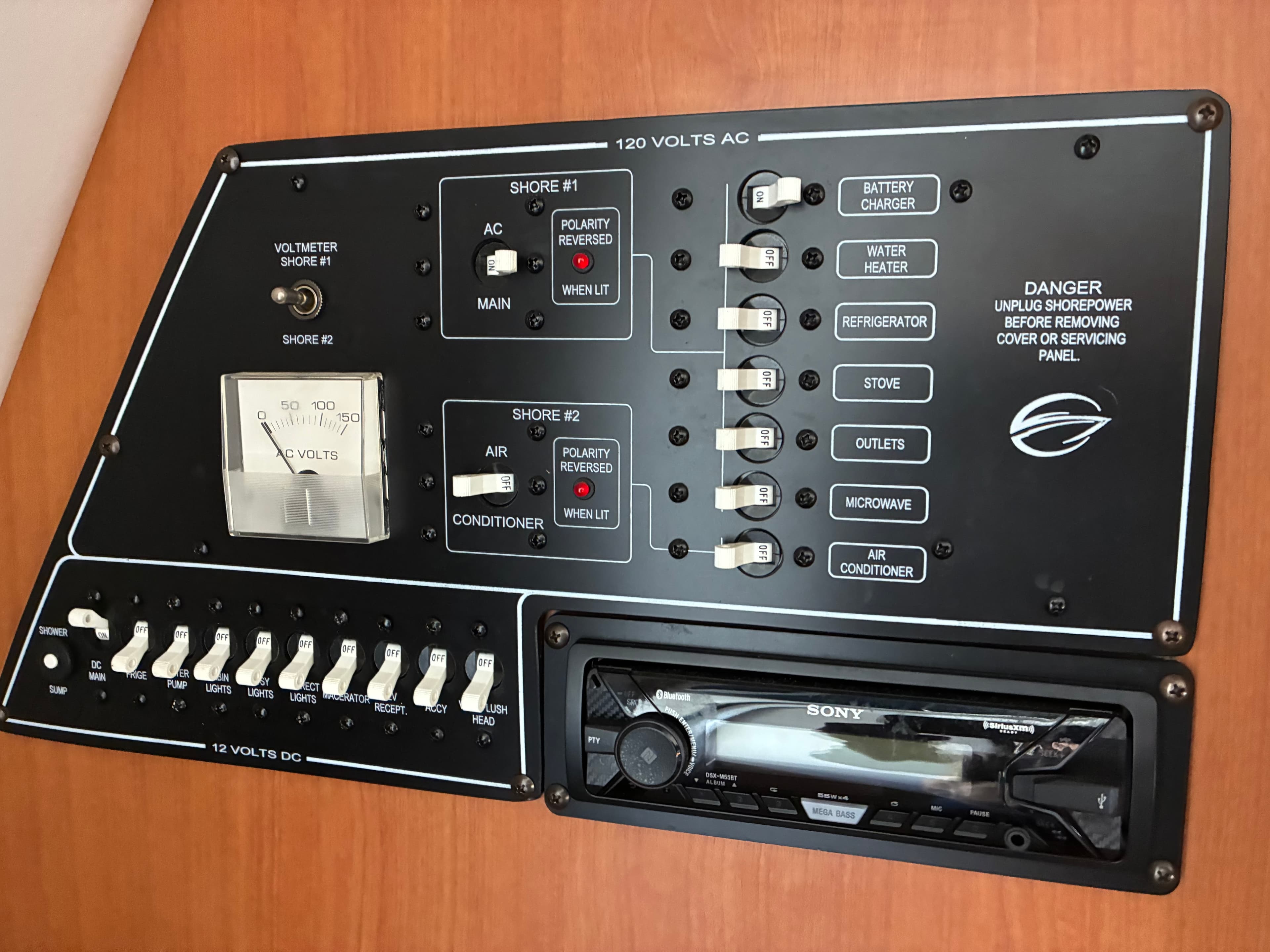 2005 Crownline 270CR 120V AC and 12V DC electrical panel with Sony stereo
