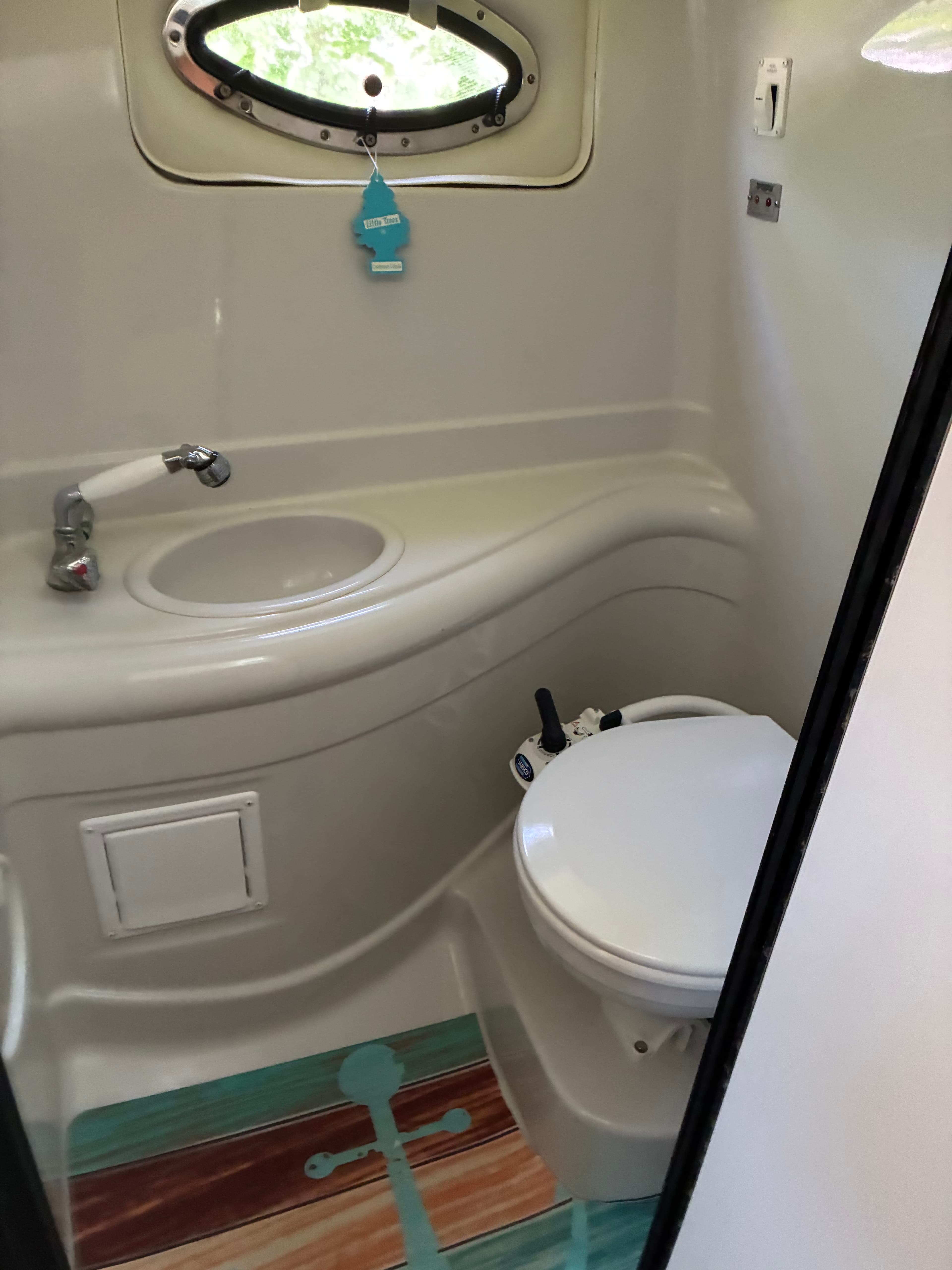 2005 Crownline 270CR enclosed head with Jabsco manual toilet