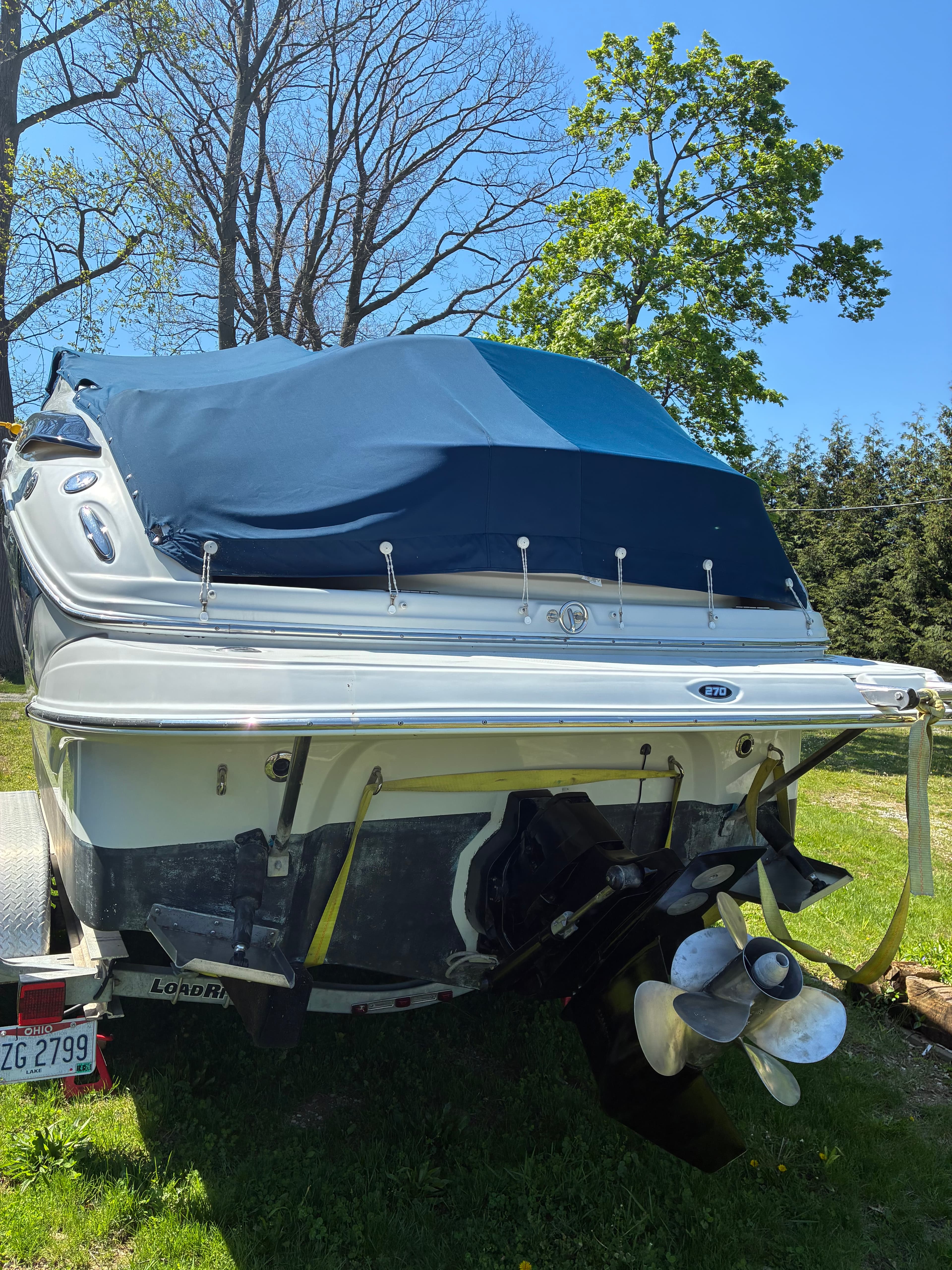 2005 Crownline 270CR stern view with cockpit cover and Bravo Three sterndrive