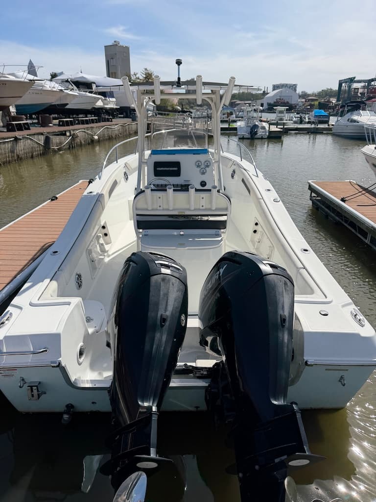 2017 Clearwater 2300 Center Console stern with twin Mercury outboards