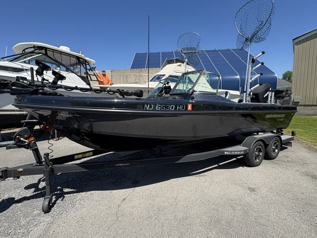 2023 Warrior V238 port side profile on its trailer at Oswego Marina on Lake Ontario