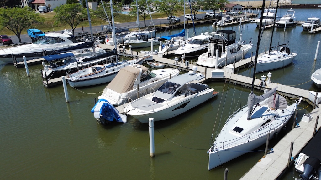 Aerial view of boats docked at a Lake Erie marina in Cleveland, Ohio — spring 2026 boat inventory available at Northern Boat Brokerage
